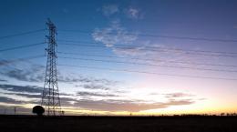 Transmission tower at sunset